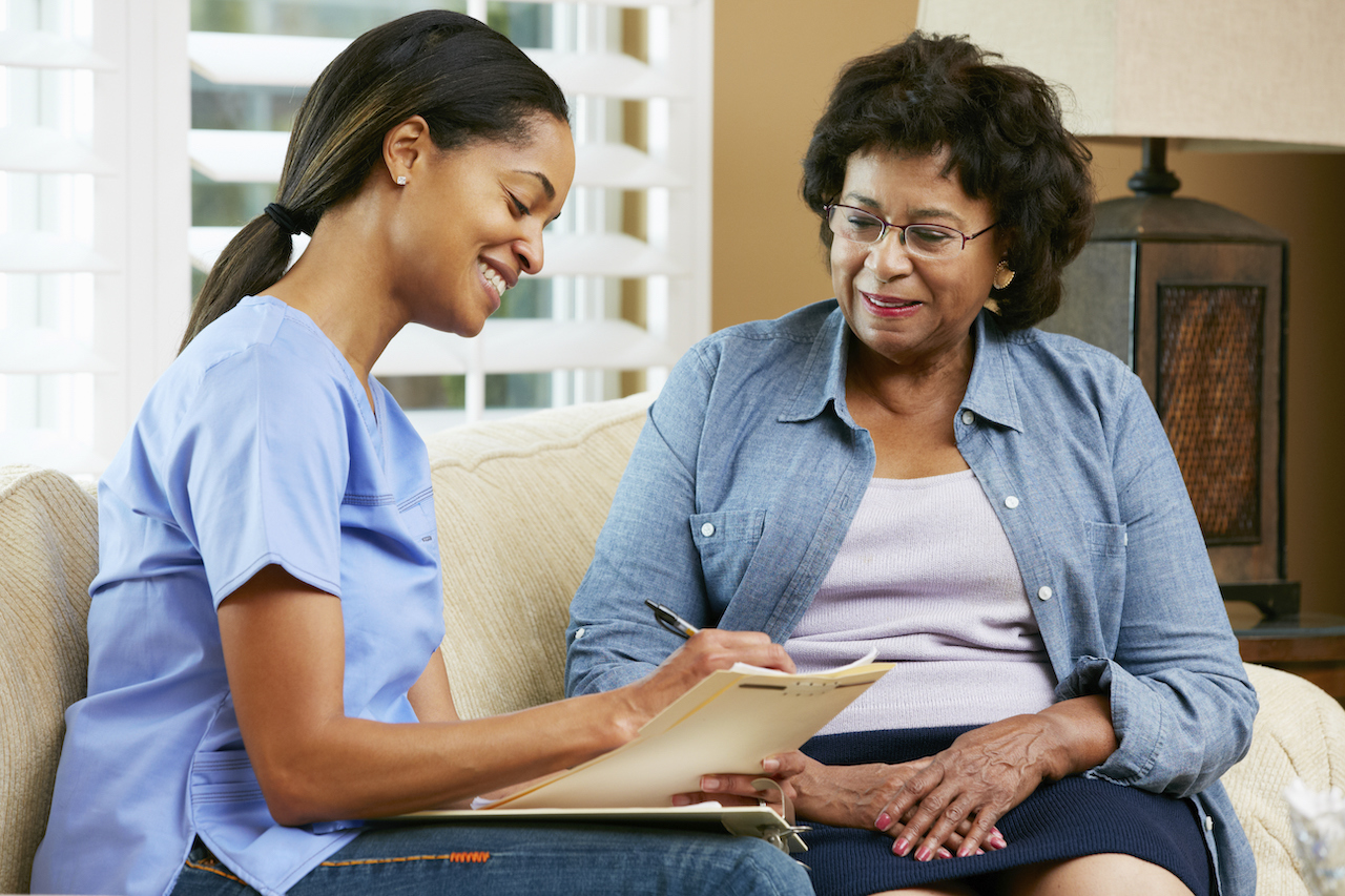 black nurse and patient