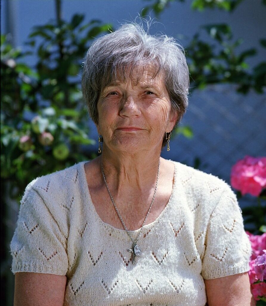 senior older woman flowers