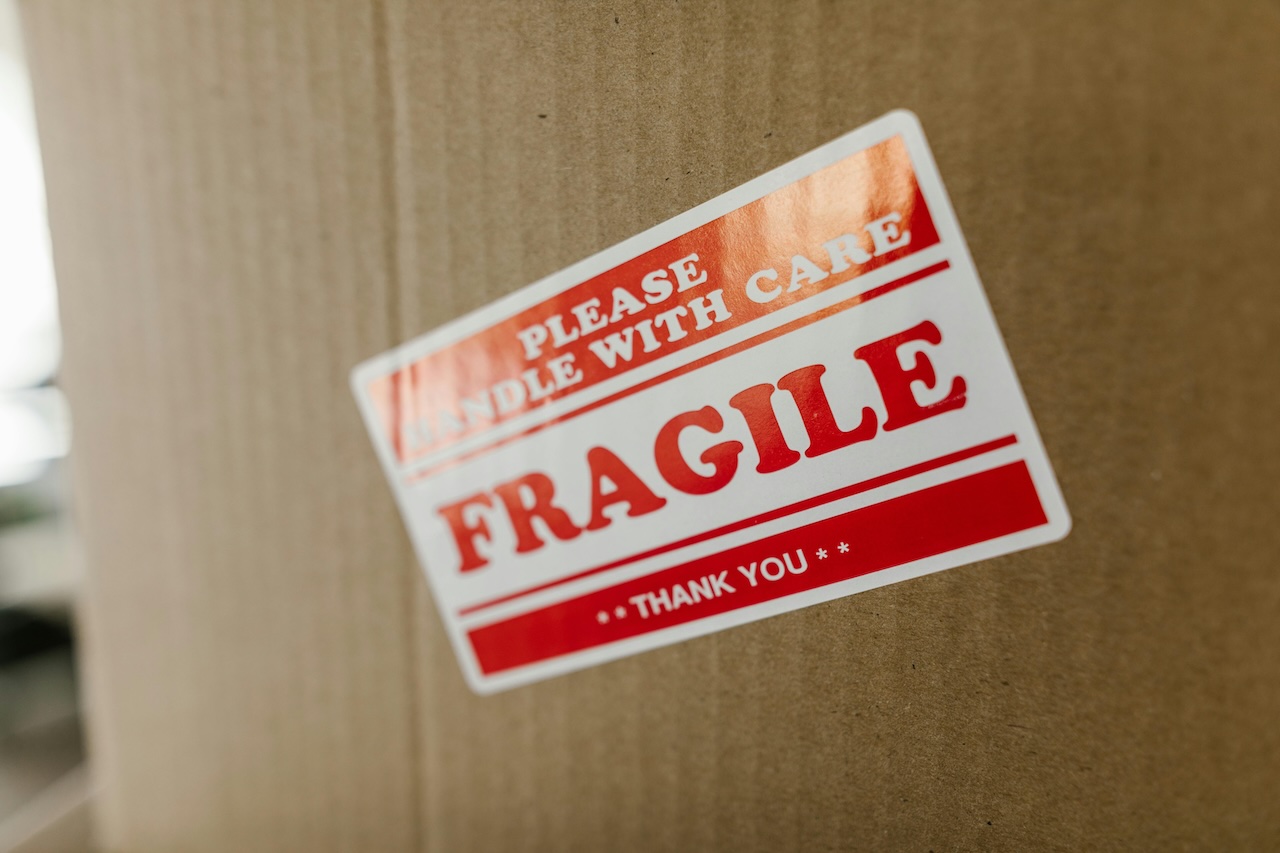 Box with fragile sticker