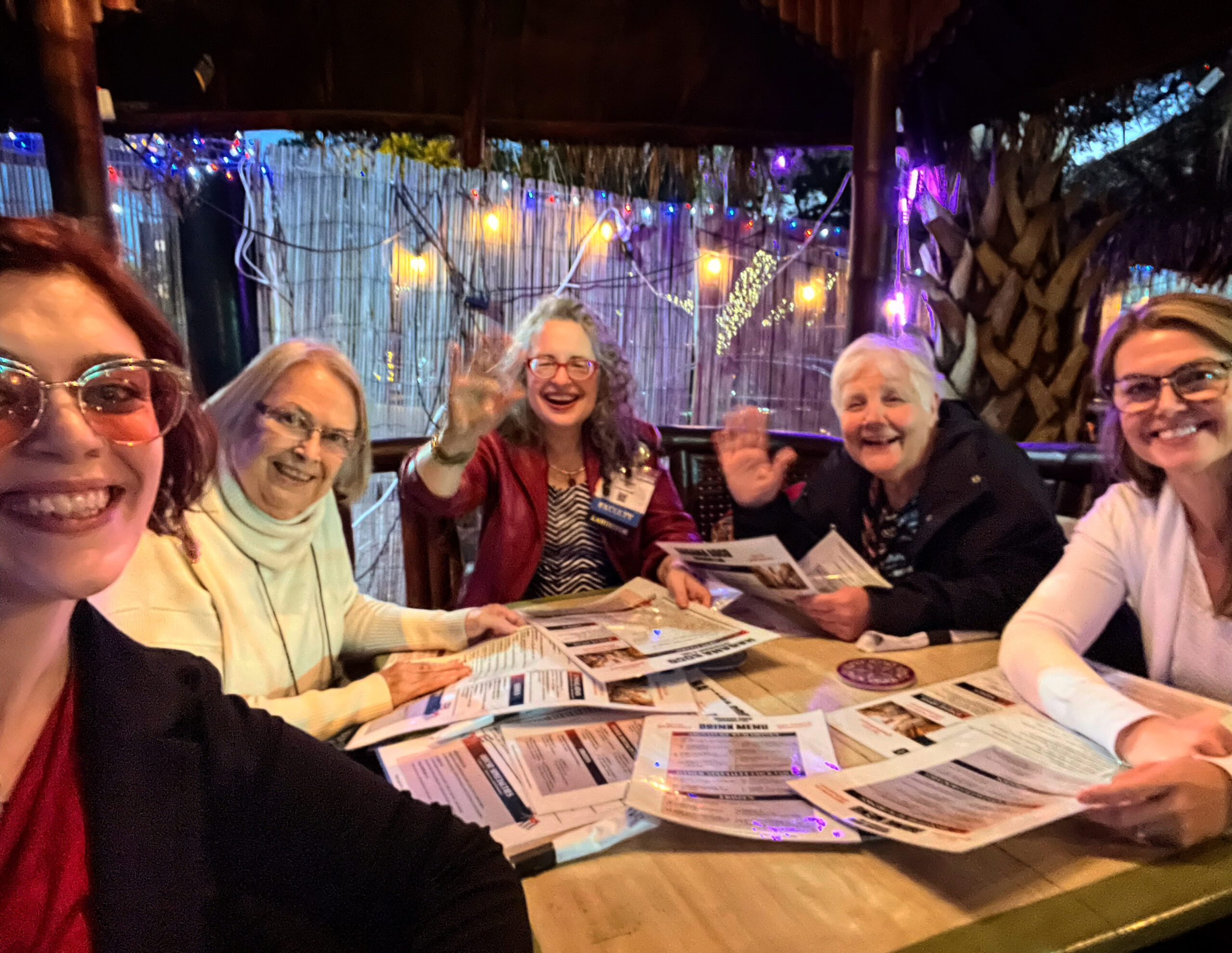 Dori sharing a cheerful moment around a table