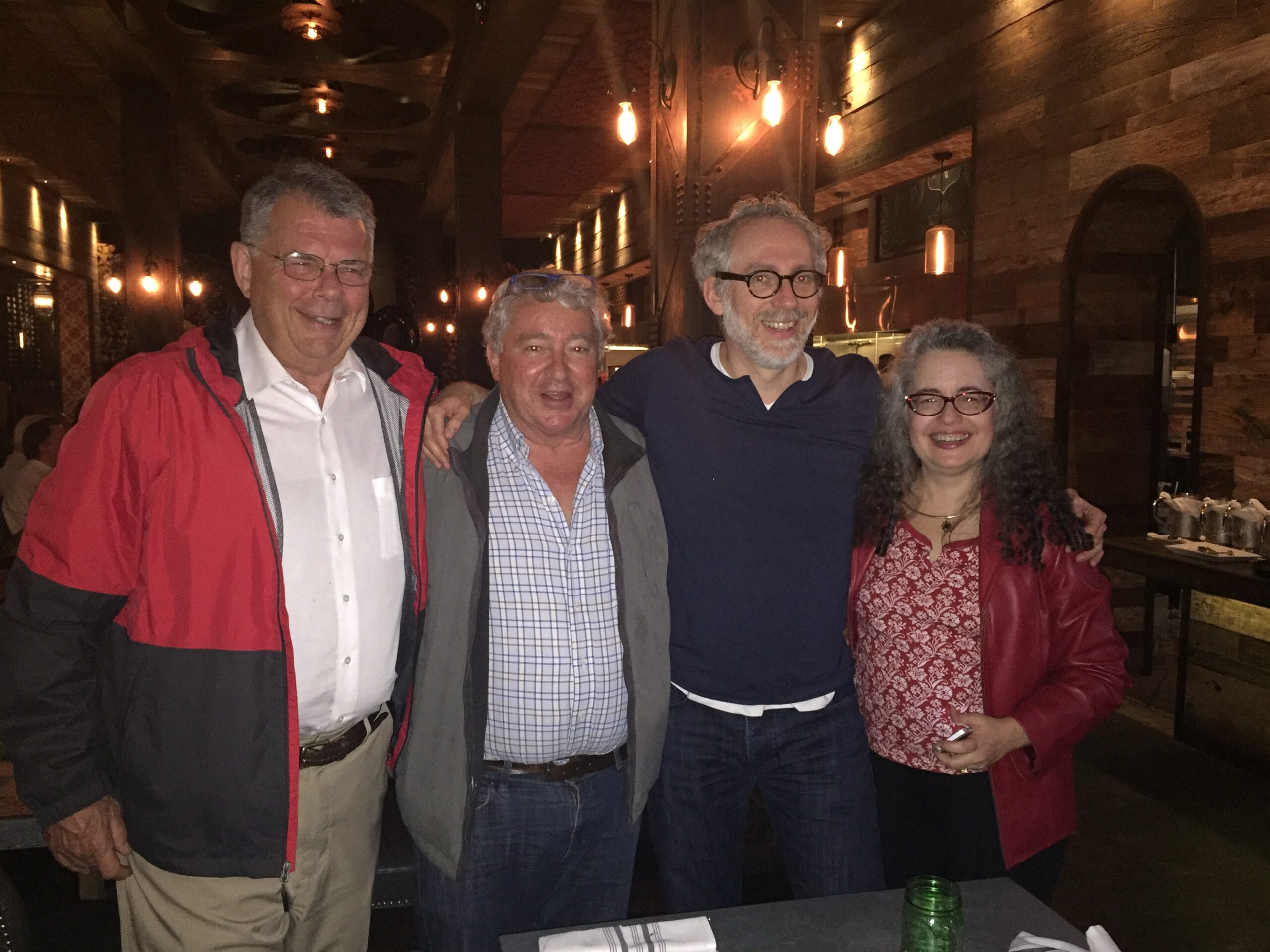 Dori with a group at a restaurant